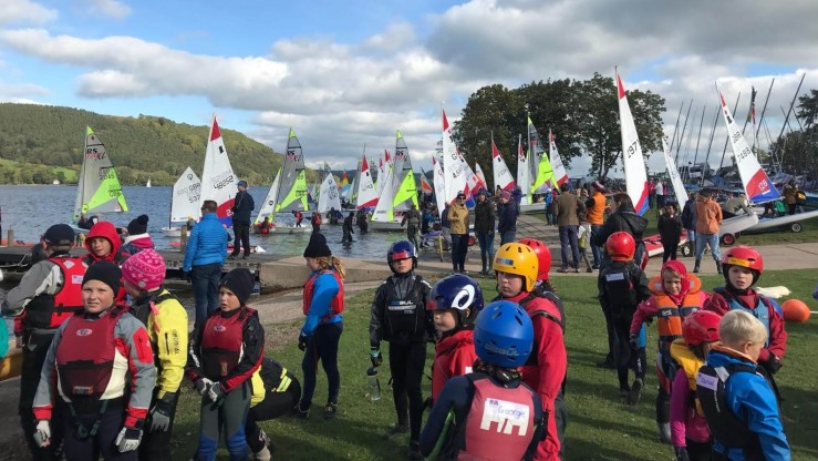 OnBoard fleet onshore at the BYS Regional Junior Championships at Ullswater 2018, with championship and regatta fleet sailors launching in the background.