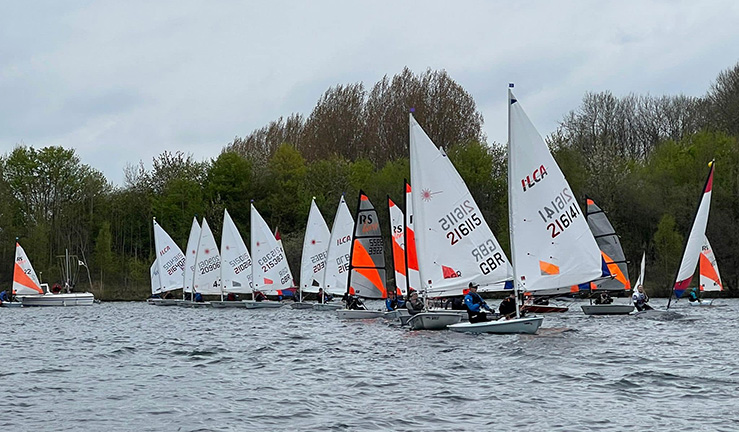 Dinghies lining up for the start of a race at a NEYYTS event 2022 