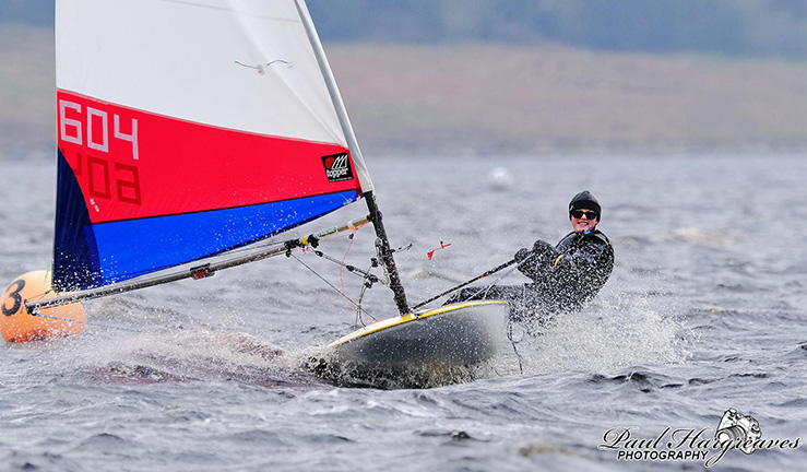 Kyla Baxter competing in her Topper dinghy.
