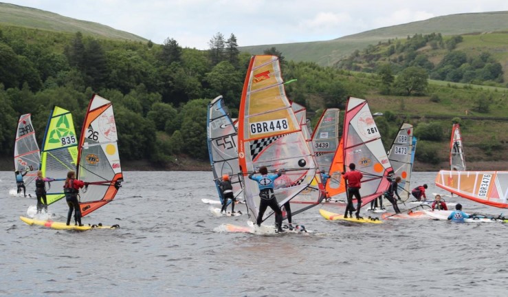 Young windsurfers in action at a breezy Glossop SC for the BYS Regional Junior Championships 2022.