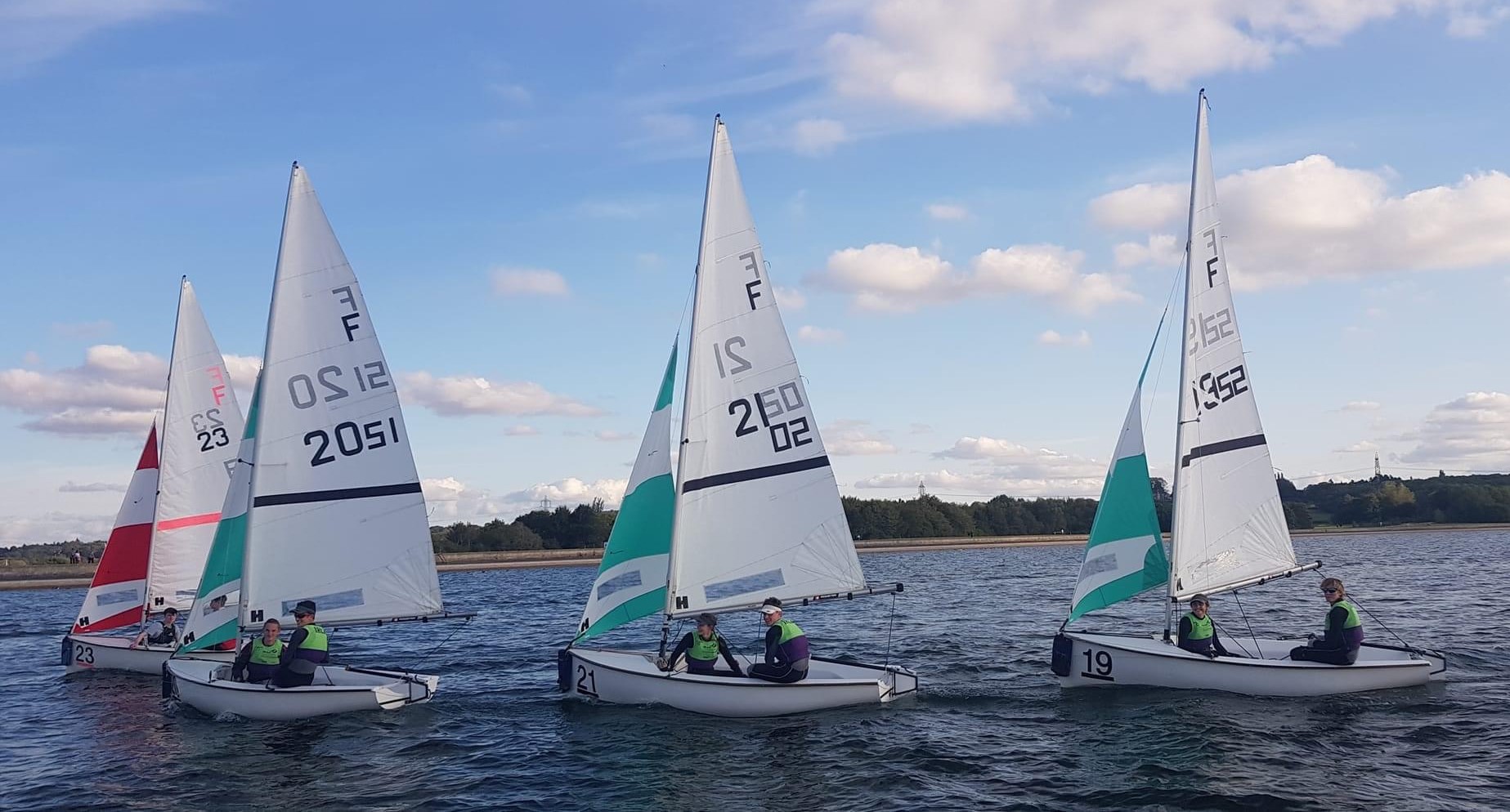 Rutland youth sailors on the water at the 2021 Eric Twiname Team Racing Championships at Oxford.