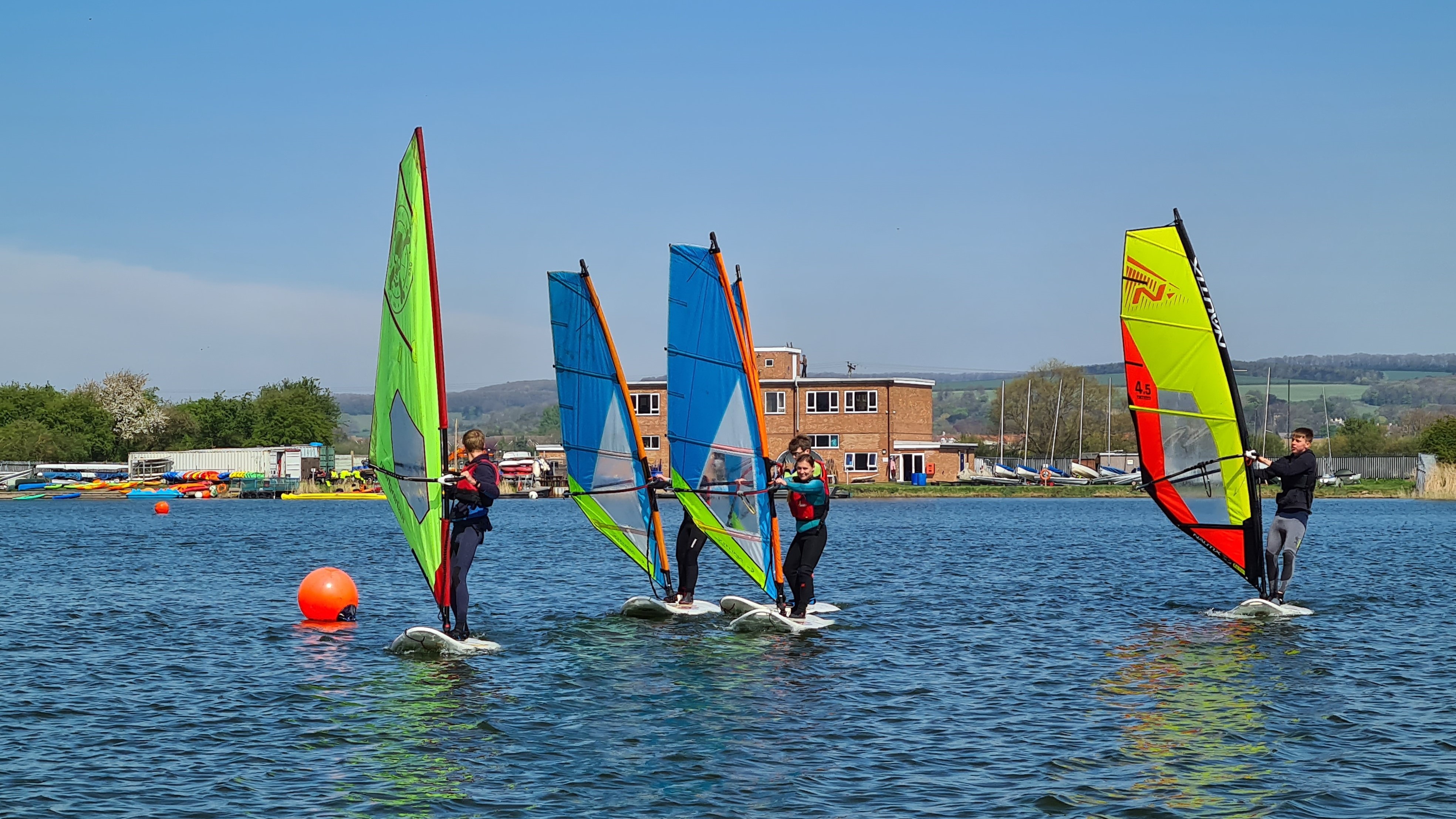 Windsurfers on the water with at Welton Waters Adventure Centre 
