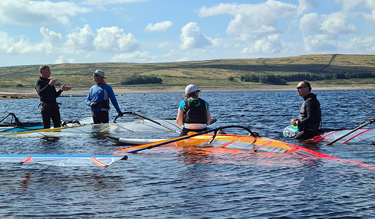Windsurfers in the water on a course in progress at Yorkshire Dales SC