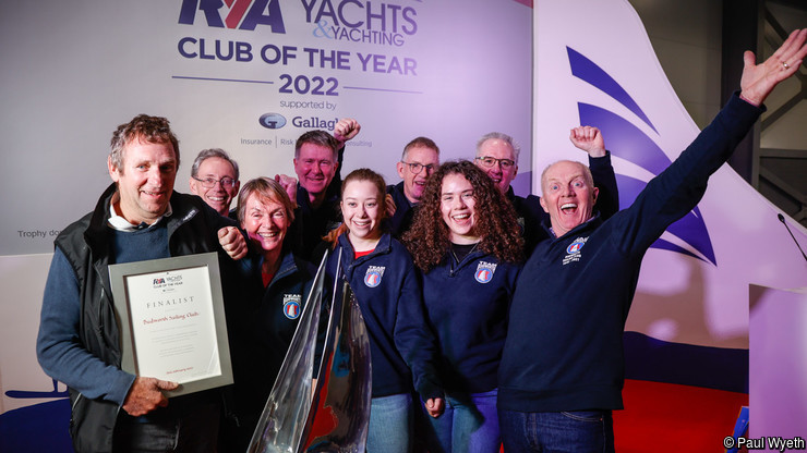 Club members celebrate with members