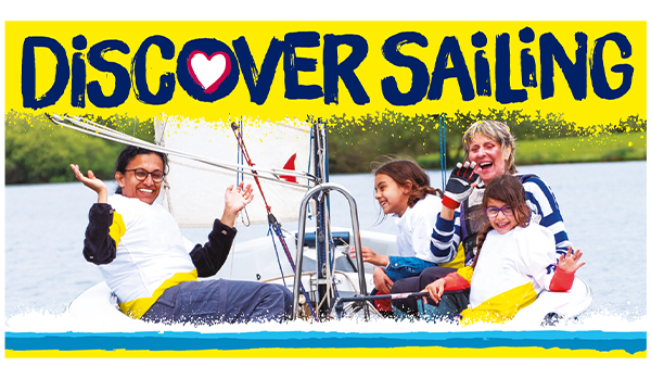 Family enjoying sailing taster session
