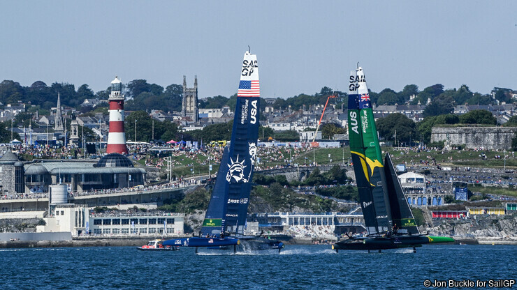USA SailGP Team helmed by Jimmy Spithill and Australia SailGP Team helmed by Tom Slingsby in action in the final race on race day 2 of Great Britain SailGP, Event 3, Season 2 in Plymouth, UK 18 July 2021. Photo: Jon Buckle for SailGP. Handout image supplied by SailGP