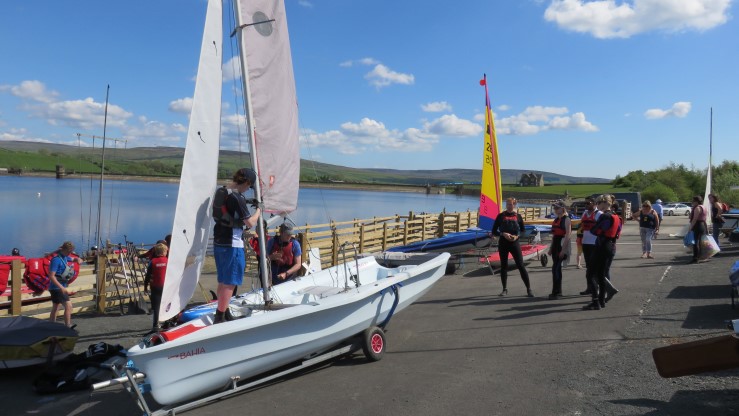 Teesdale Sailing and Watersports Club on shore and lake in background.