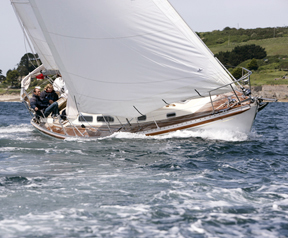 An image of a sailing yacht underway on the water.