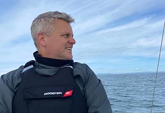 Portrait of Adam Dearnley afloat at North Berwick. 