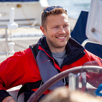 Smiling man on large boat