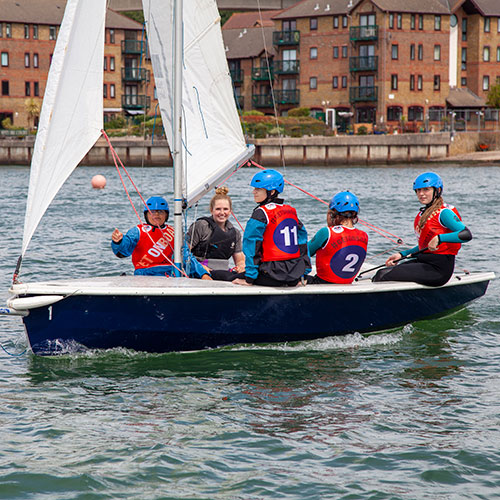 people having fun sailing examples