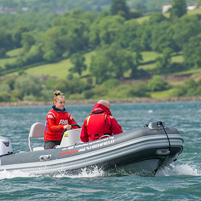 young person driving motorised RIB01