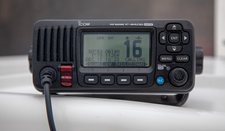 Fixed VHF marine radio set to channel 16. How to do a mayday call