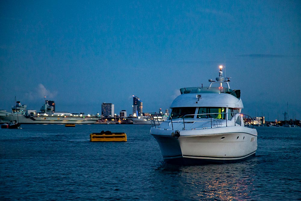 wide shot of dark yacht