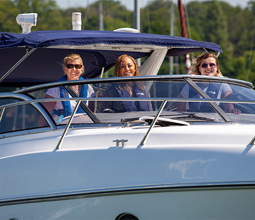 Happy people on a motor boat