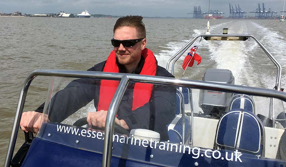 Liam Battersby on a powerboat near his local club
