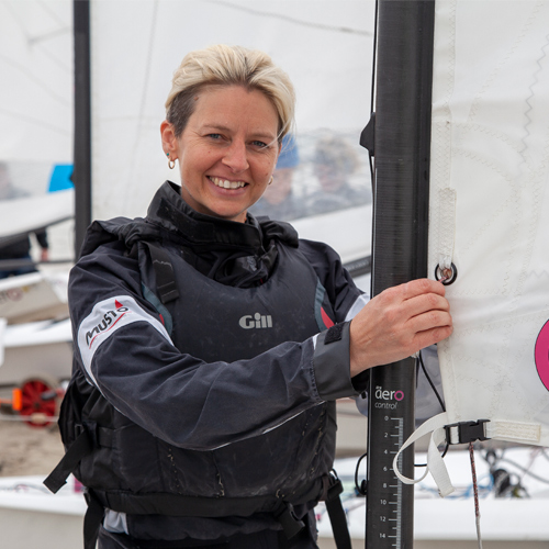 A RYA member holding a sail