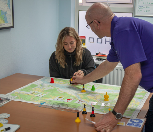 2 people looking at a map