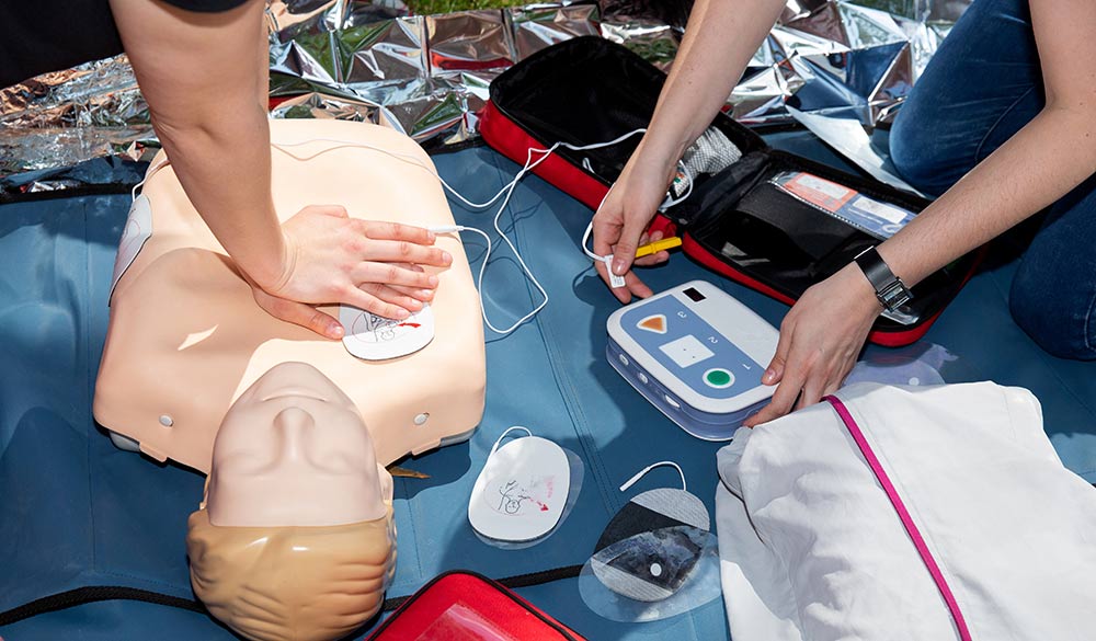 close up of CPR training with dummy