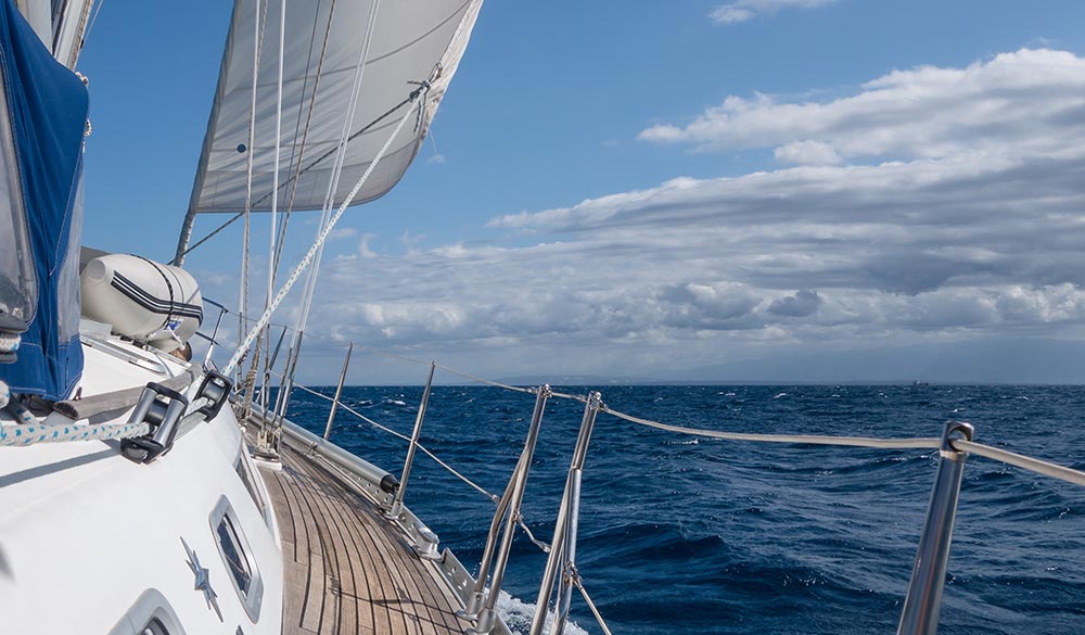 wide shot of boat sailing through the water