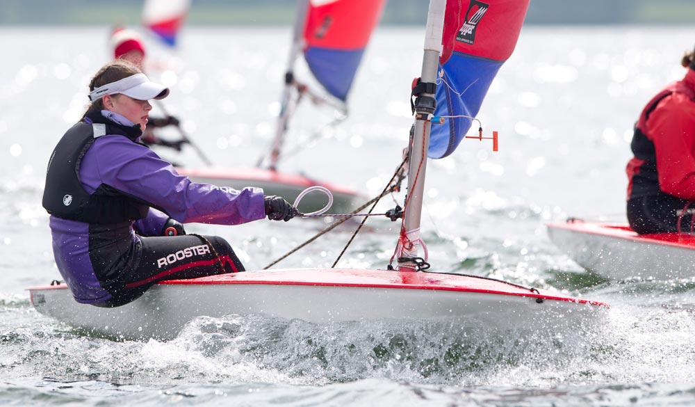 Wide shot of student sailing on a dinghy as part of GCSE sailing 