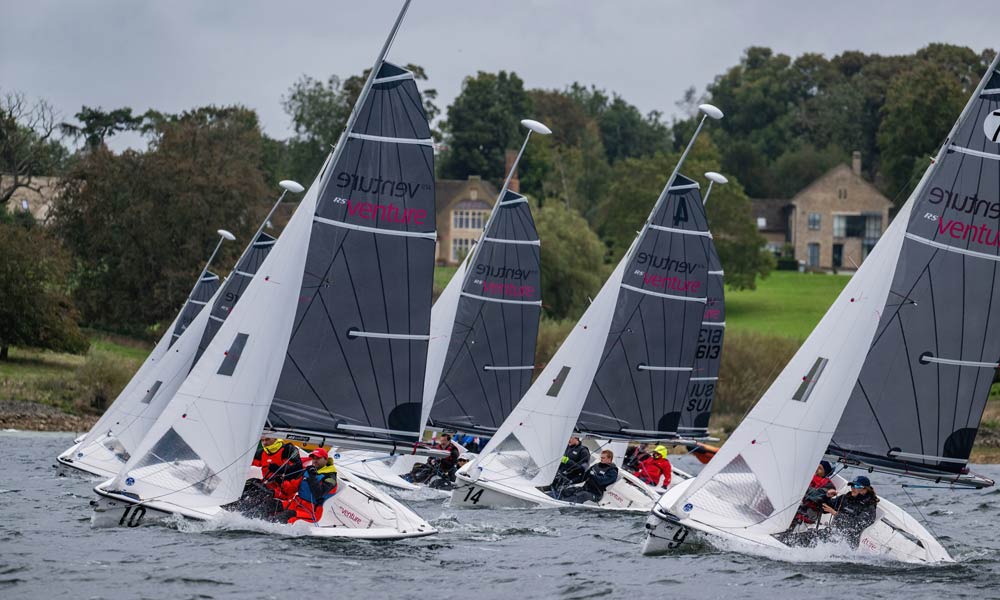 multiple boats sailing on the water