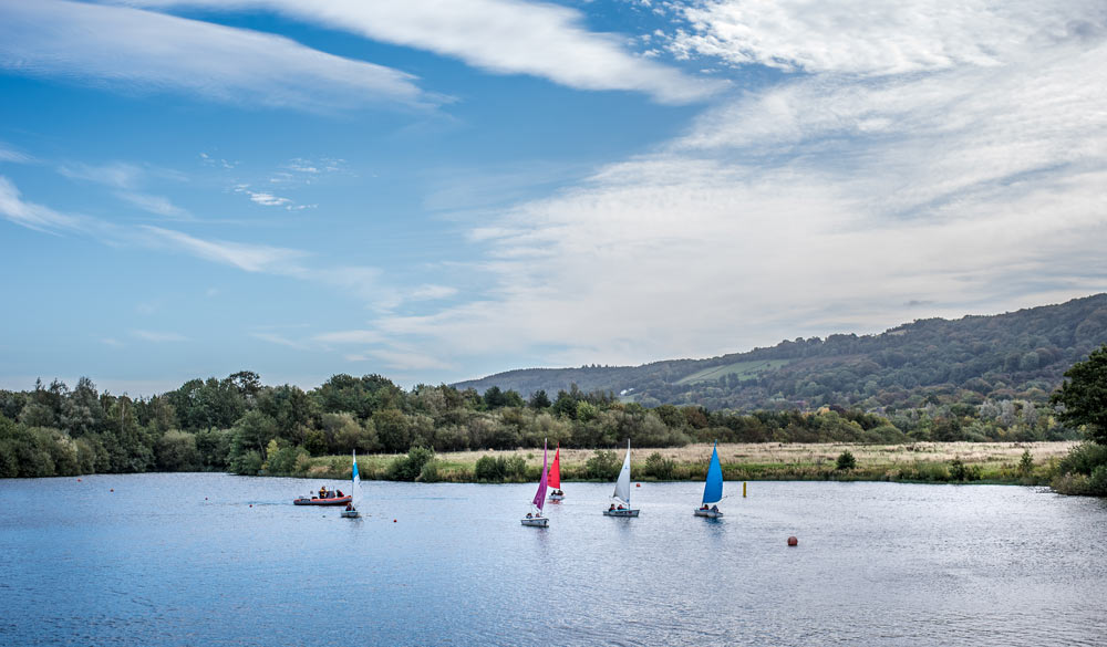 Sport England, boats sailing in idyllic waters