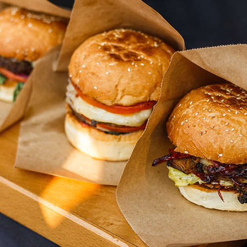 closeup of tasty burgers with vegetarian and vegan options available