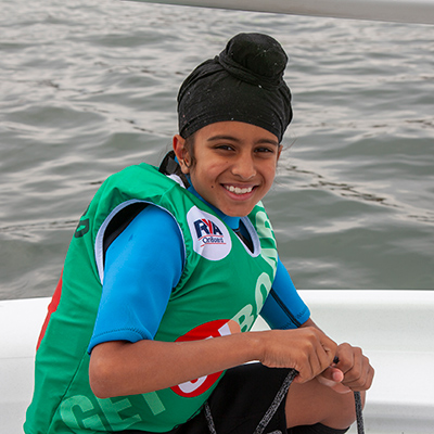 smiley child on the water