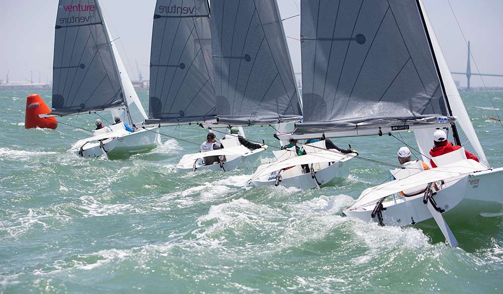 Action shot of dinghy race on the open water