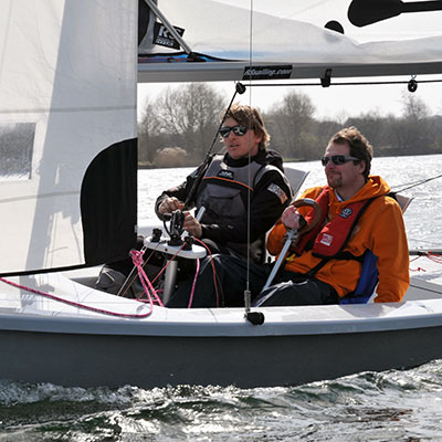 two sailor in a dinghy on a winters day 