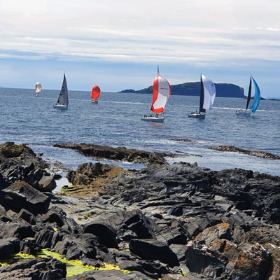 wide shot of racing dinghys