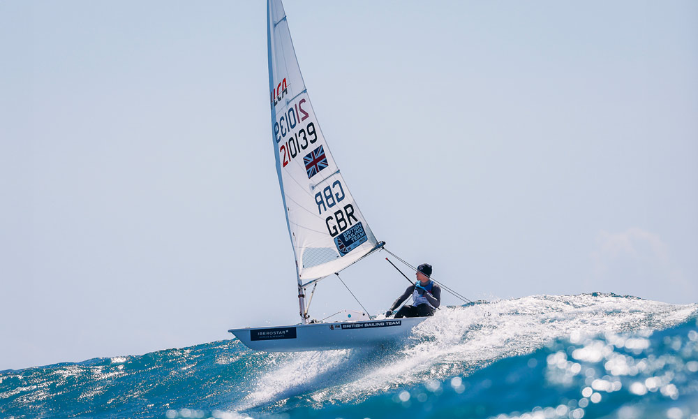 dinghy skimming the water