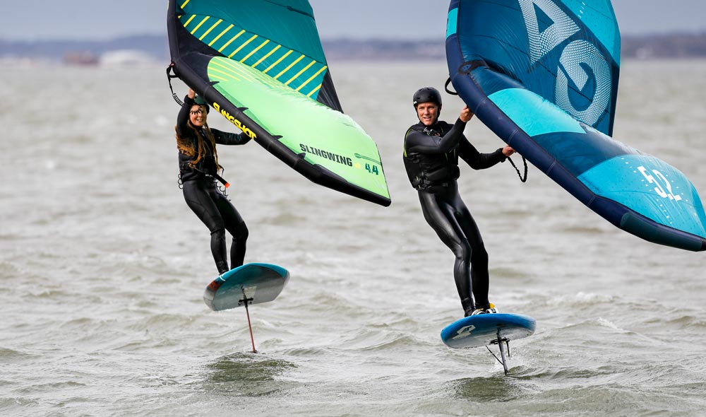 wideshot of two people winging 