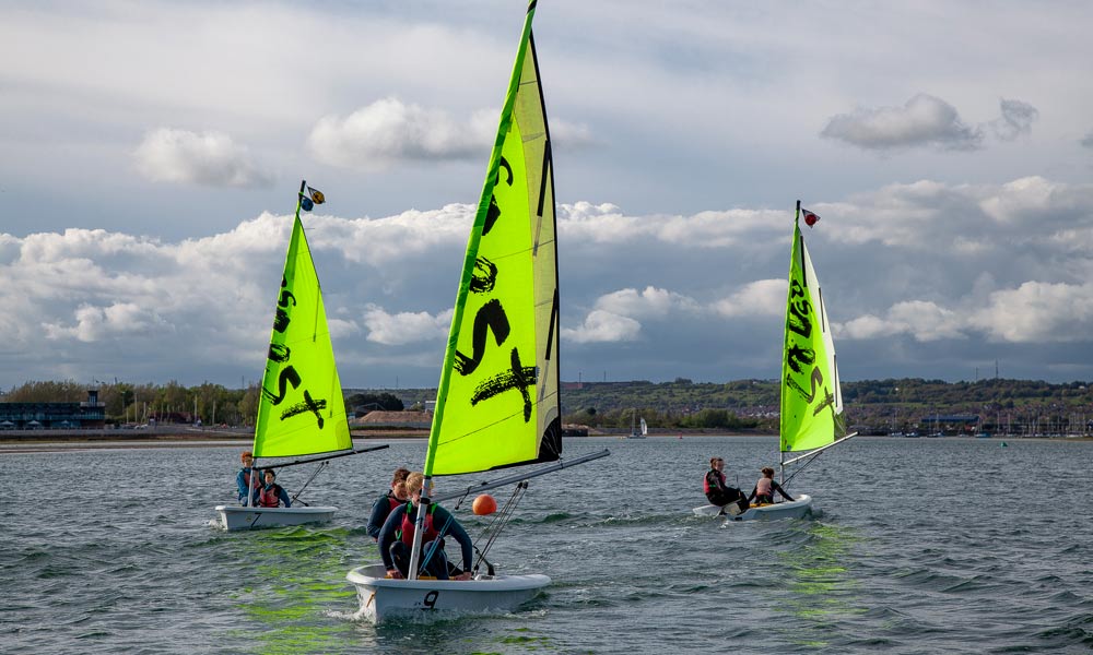3 dinghies sailing 