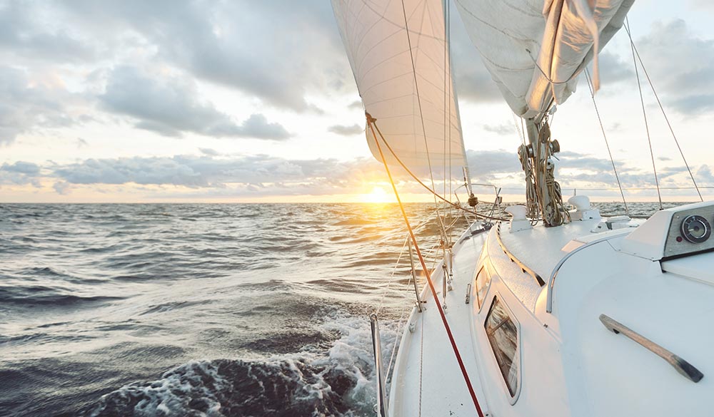 wide shot of boat sailing on the water