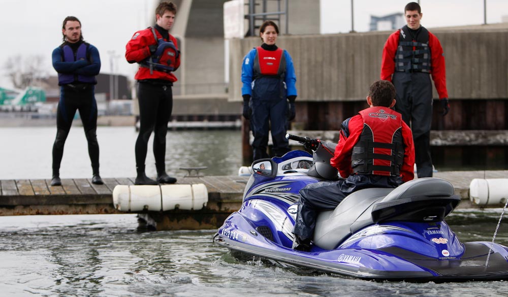 Group of people in training for riding PWC