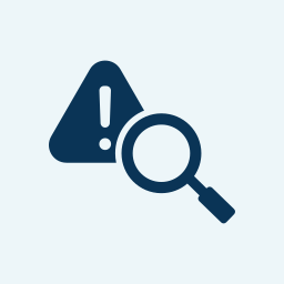 Warning icon with a magnifying
          glass on top