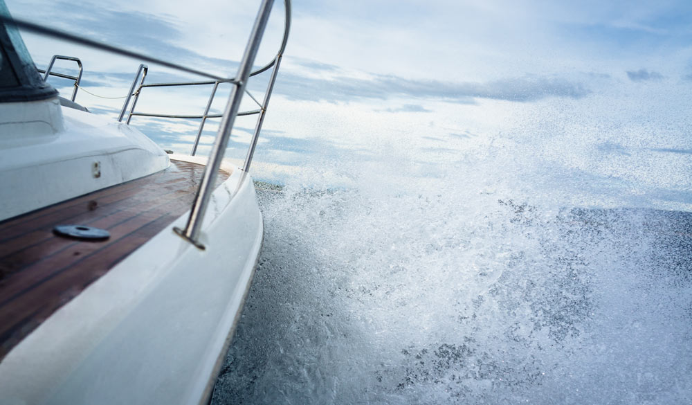 Powerboat sailing in rough weather and tides 