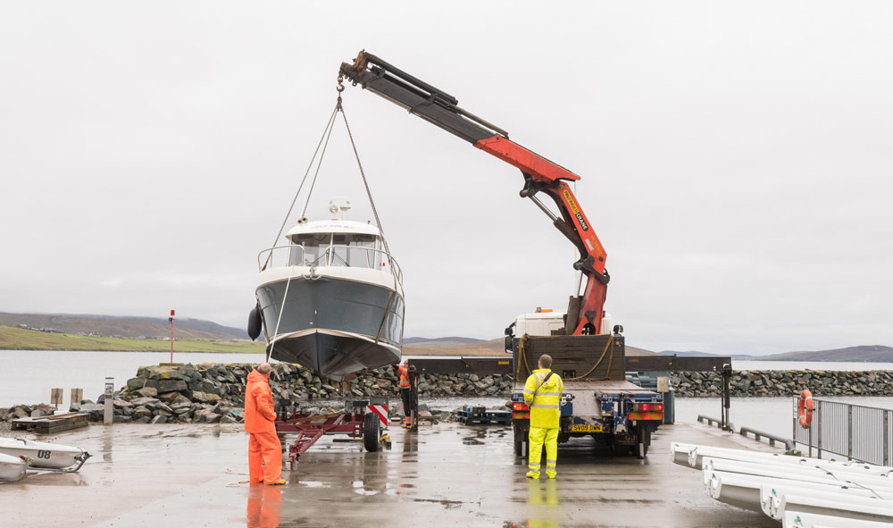 boat being lifted out of the water