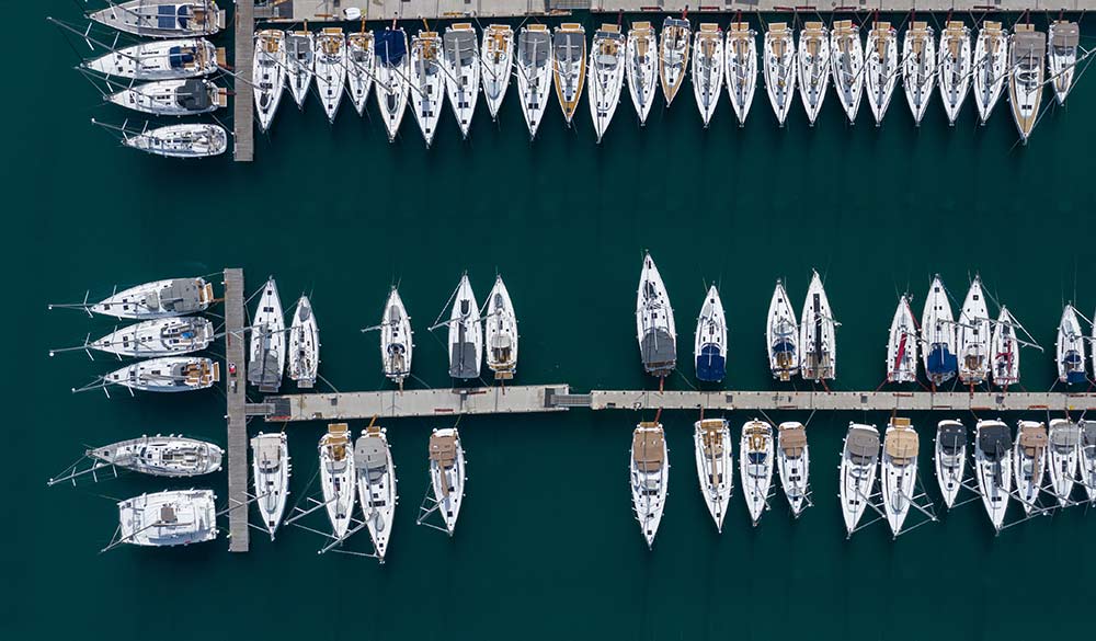 wide shot of multiple boats from birds eye view