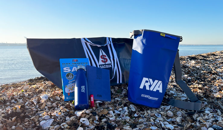 Christmas countdown prize draw - Sacqua bag, Overboard bag, RYA diary, water bottle and Day Skipper book on the beach