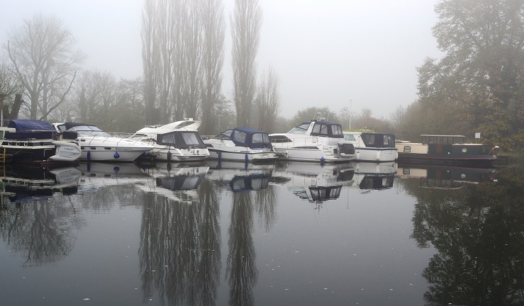 Motor boats at a stoppage during winter