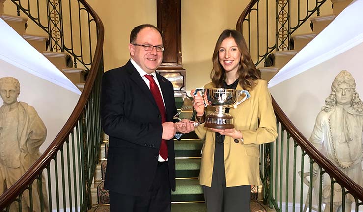 Harriet Averns being presented with the RYA Yachtmaster of the Year trophy