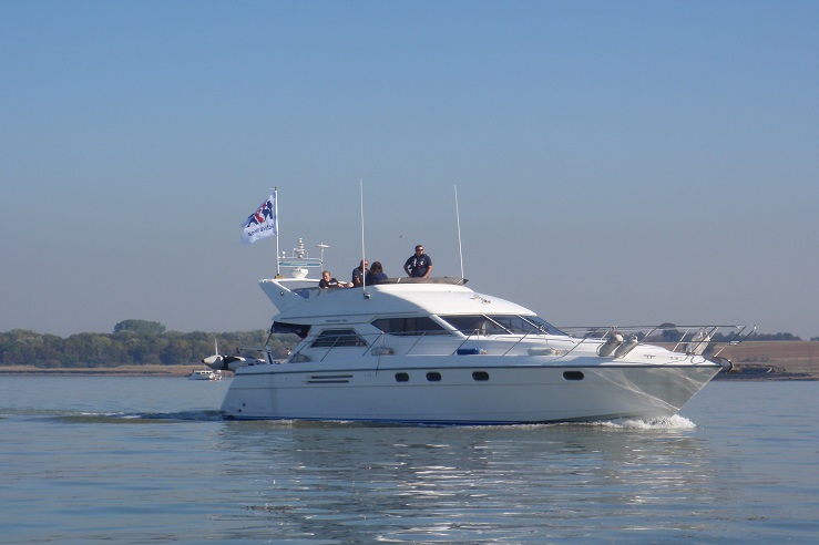 Motor cruiser on the water on a sunny day