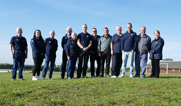 Group photograph of the RYA Midlands regional team, staff and volunteers, at Whitemoor Lakes.