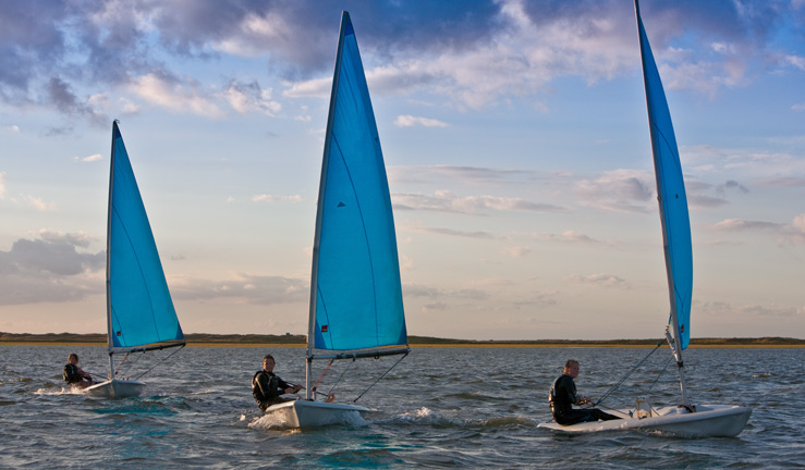 RYA member offers Bishop Skinner Marine. 3 dinghies sailing towards camera.