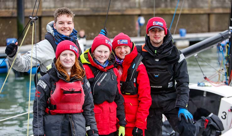 Team of BKA sailors on shore at Cowes inlcuding Heather Quinn and Emily Wright