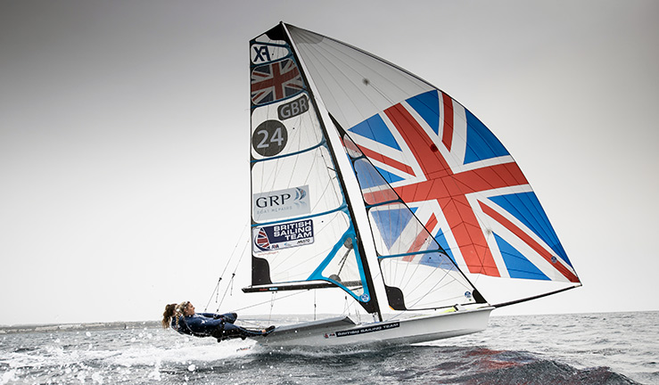 dynamic wide shot of two tall women competing in skiff race