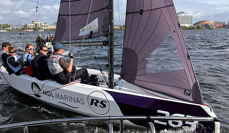 A youth team aboard an RS21 at the RYA Harken Youth Match Racing Championship 2022